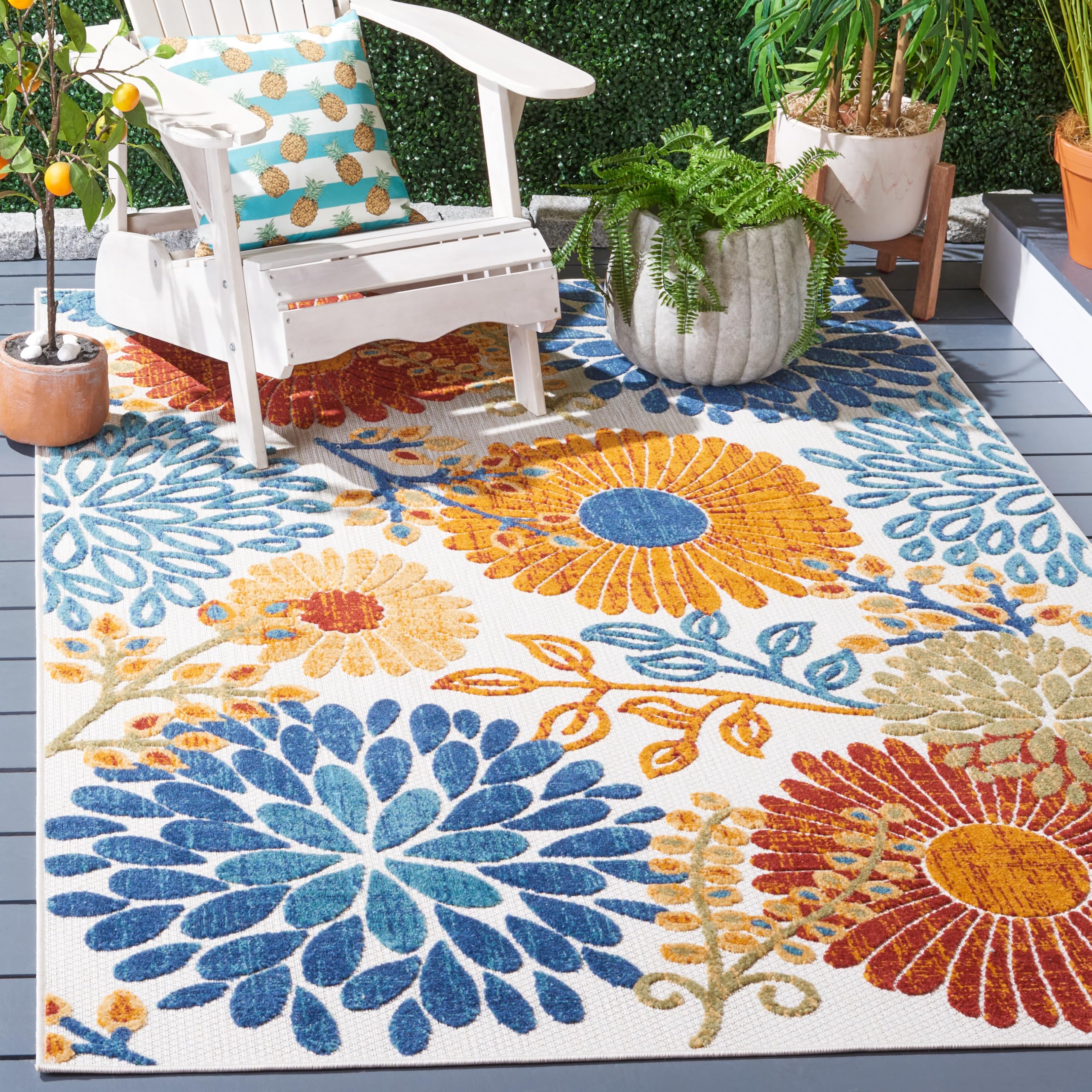 Safavieh Cabana outdoor rug on patio in cream and red; durable outdoor use.