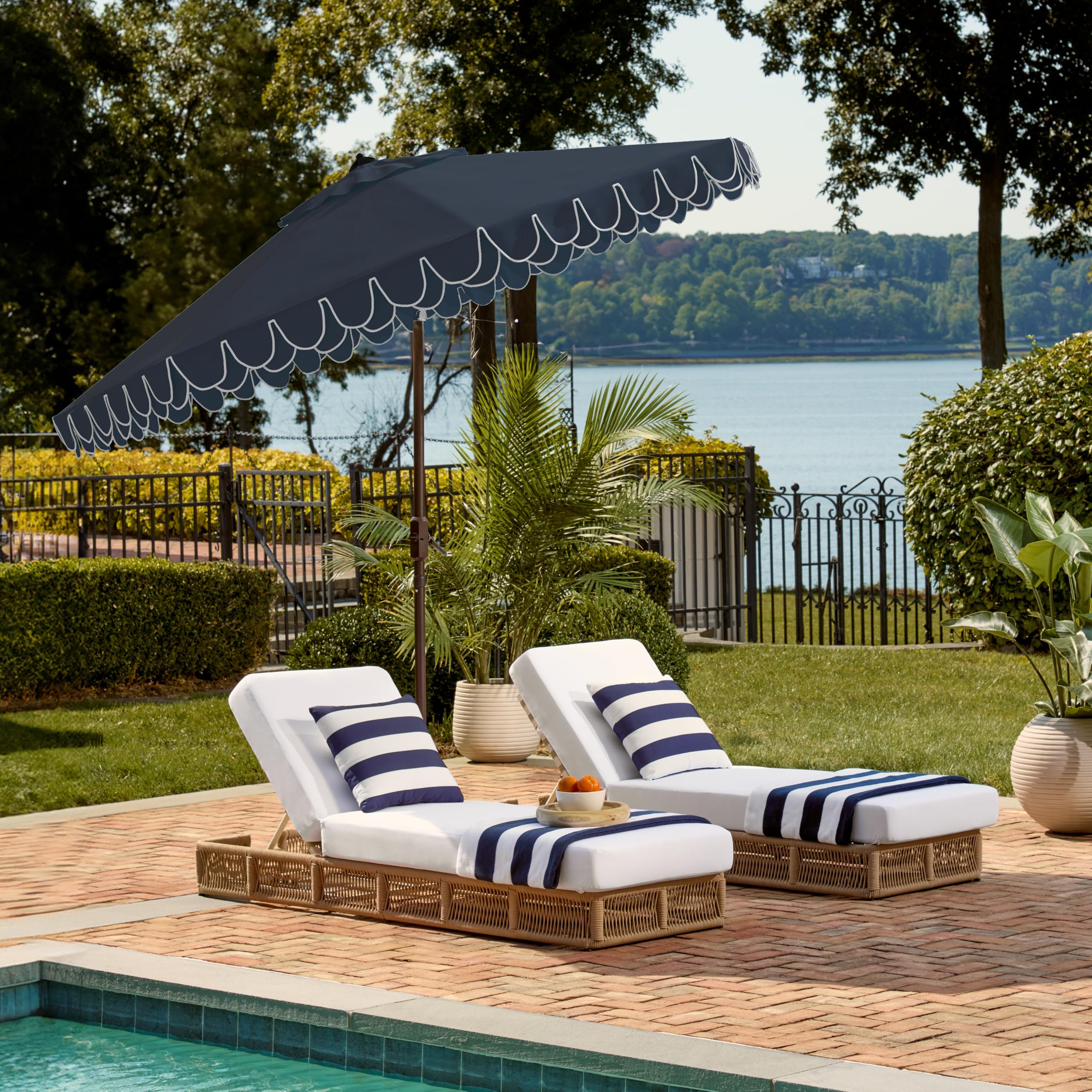Safavieh weather-resistant outdoor umbrella for all-season use.