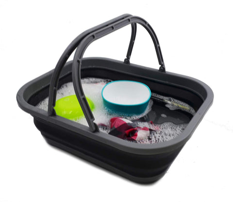 SAMMART 12L collapsible tub dual handles beside car trunk for shopping trips.