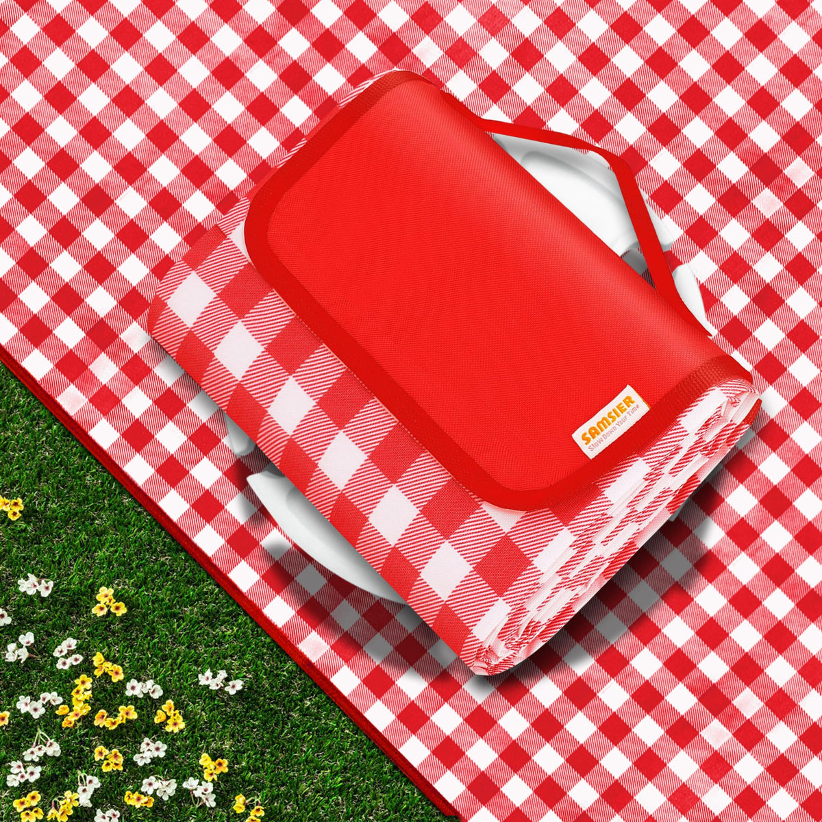 SAMSIER picnic blanket laid flat on grass; waterproof and sandproof for family picnics.