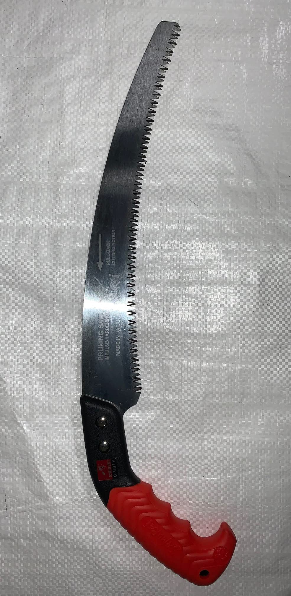 Samurai Ergogrip orange handle providing comfortable grip during pruning.