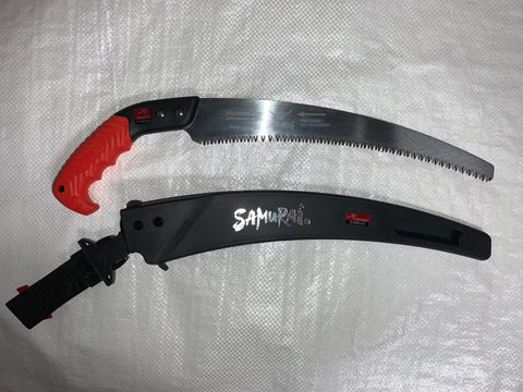 Samurai Kanzawa Ichigeki pruning saw blade close-up in use.
