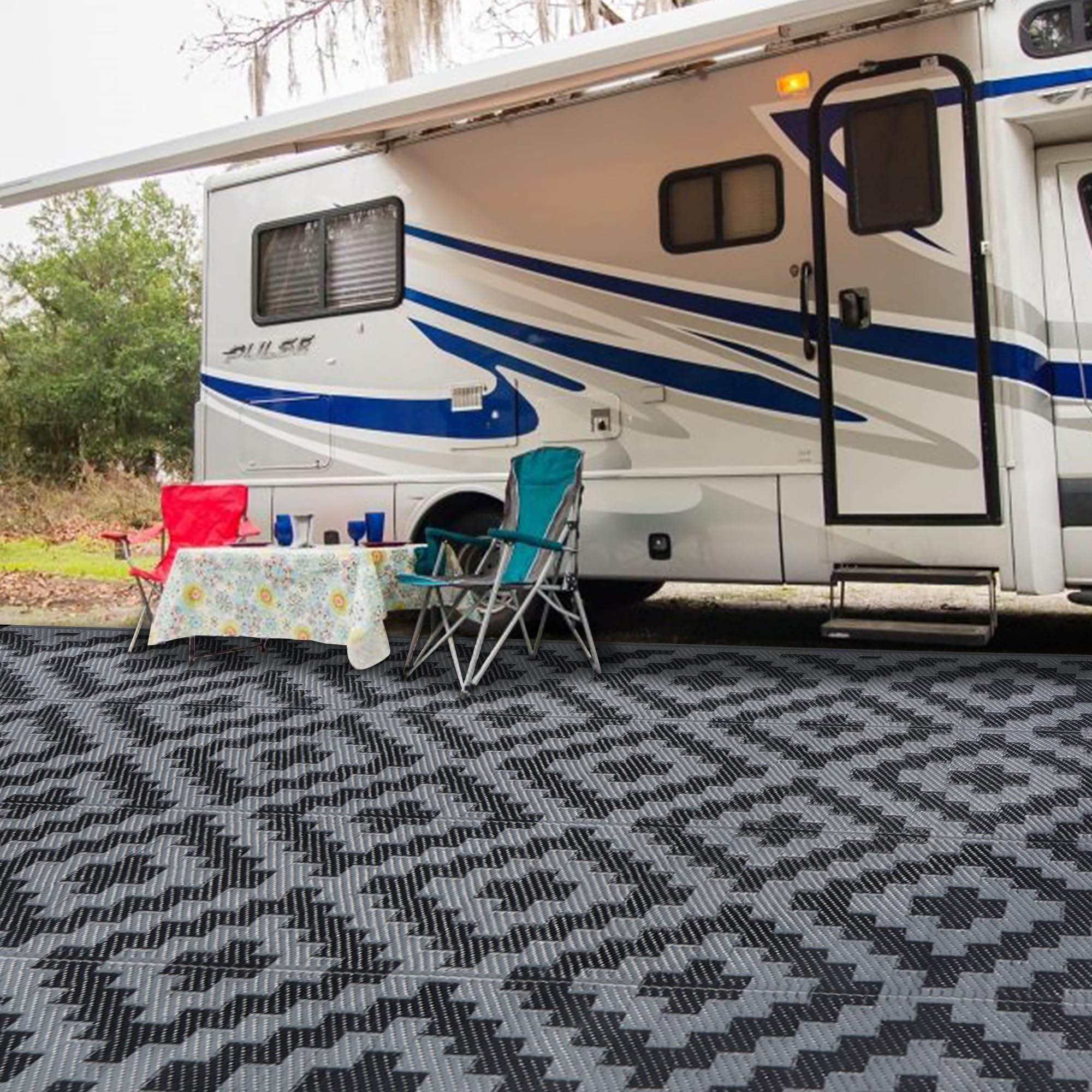 SAND MINE foldable outdoor rug with carrying bag for trips.