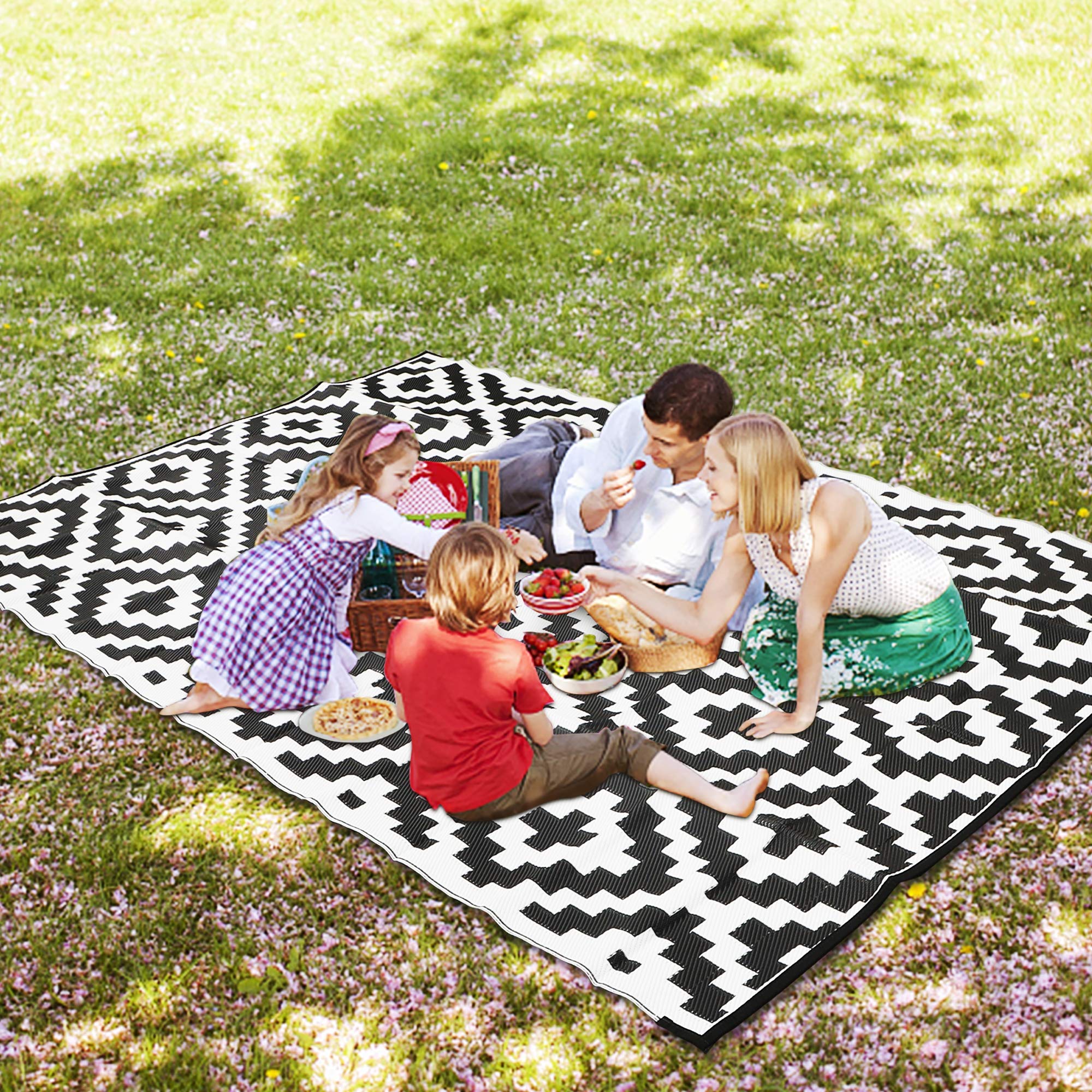 SAND MINE foldable portable rug packs into its carry bag for trips.