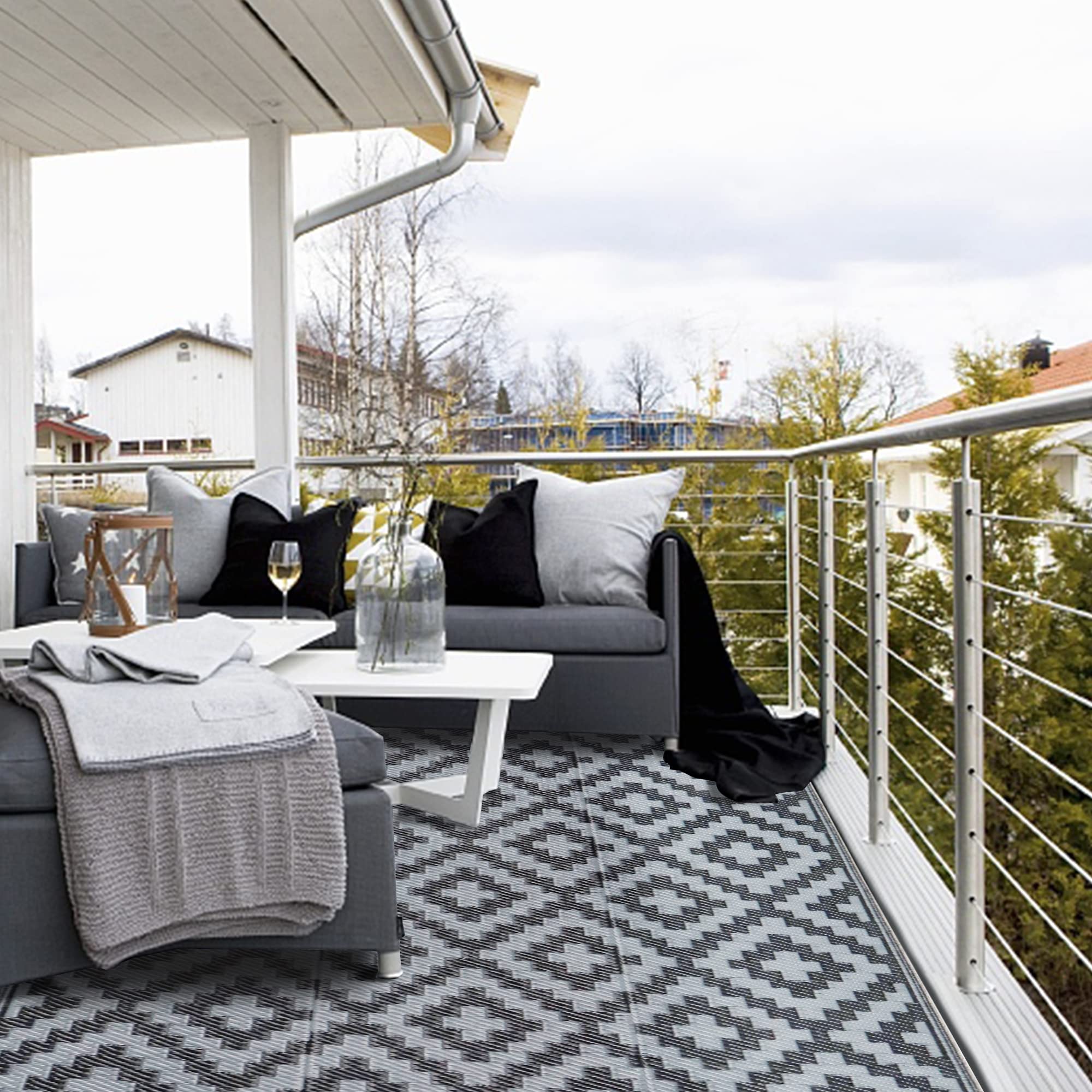 SAND MINE breathable rug that is grass-friendly and deck-safe