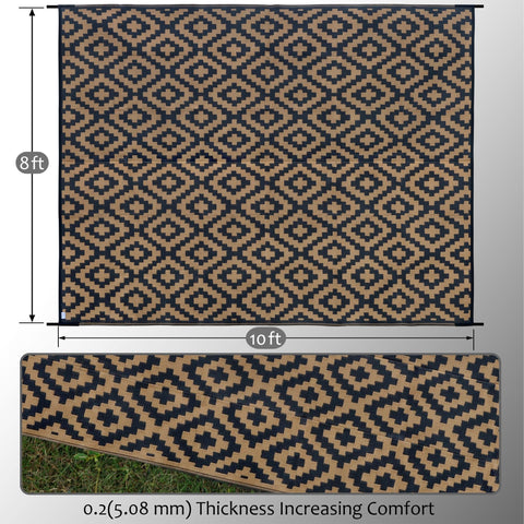 SAND MINE plastic straw rug at the beach offers easy cleanup after seaside gatherings