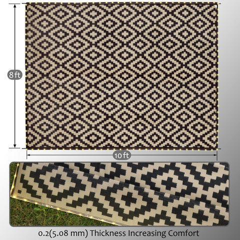 SAND MINE outdoor rug with glowing LED strip lighting on grass