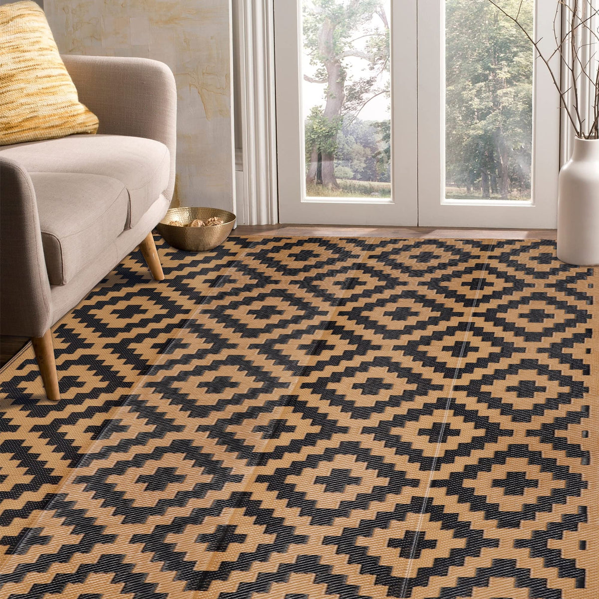 SAND MINE reversible mats on patio with furniture for stylish outdoor decor.