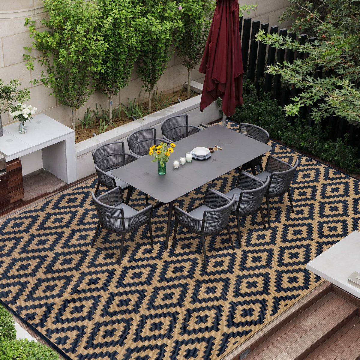 SAND MINE reversible mats on a patio rug, delivering stylish durability outdoors