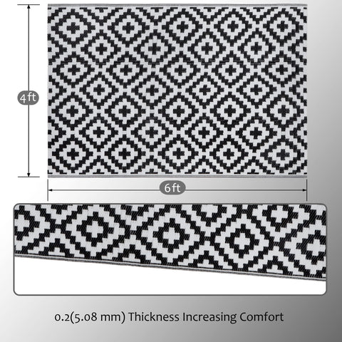 SAND MINE reversible outdoor rug on patio with furniture for versatile styling.
