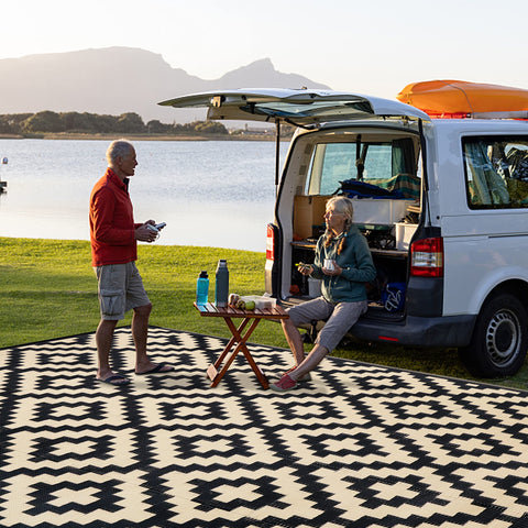 SAND MINE durable polypropylene rug for deck or patio gatherings.