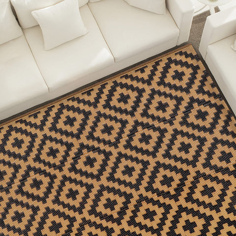 Sand MINE versatile outdoor rug ideal for camping and beach setups.