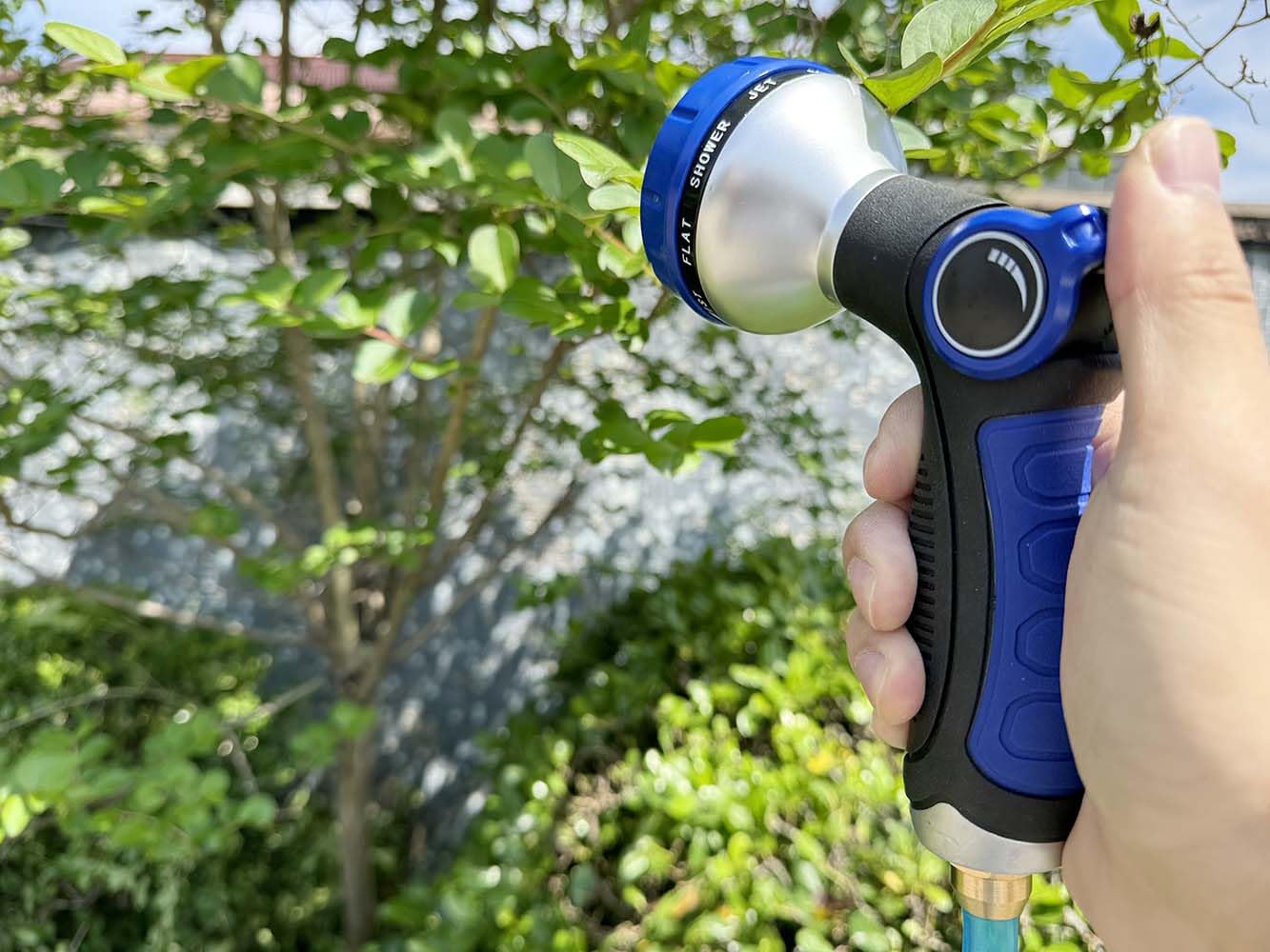SANFU EVA blue hose shown on a patio for gardening and cleaning