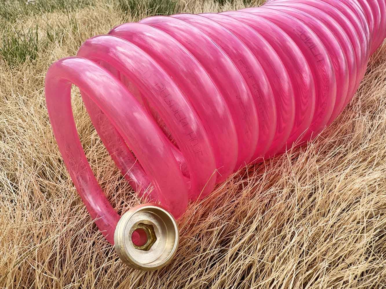 SANFU EVA Recoil Hose in transparent pink shows lightweight, flexible design