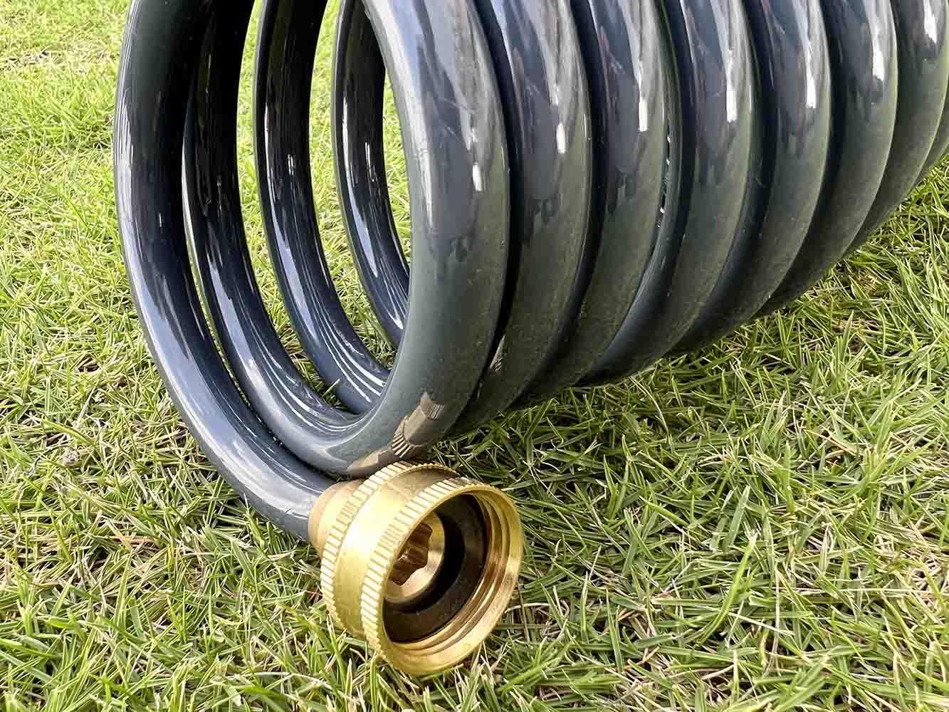 SANFU PU Recoil hose on boat deck shows kink-free flexibility.