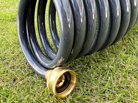 SANFU PU Recoil hose on boat deck shows kink-free flexibility.