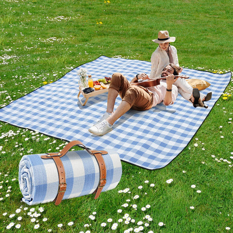 Sapsisel waterproof beach blanket keeps you dry on sand.