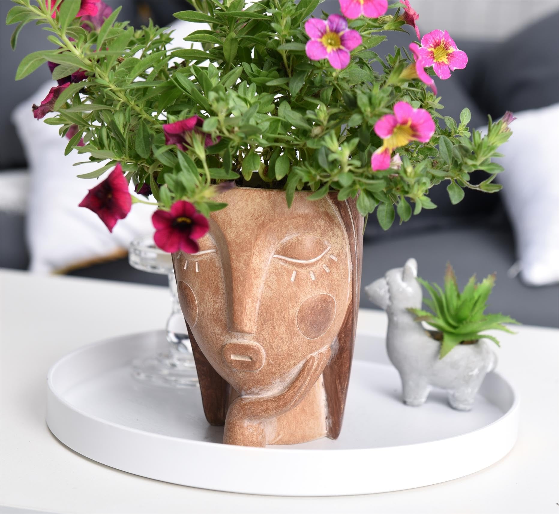 Saysmile head planter doubles as stylish desk storage for small items.
