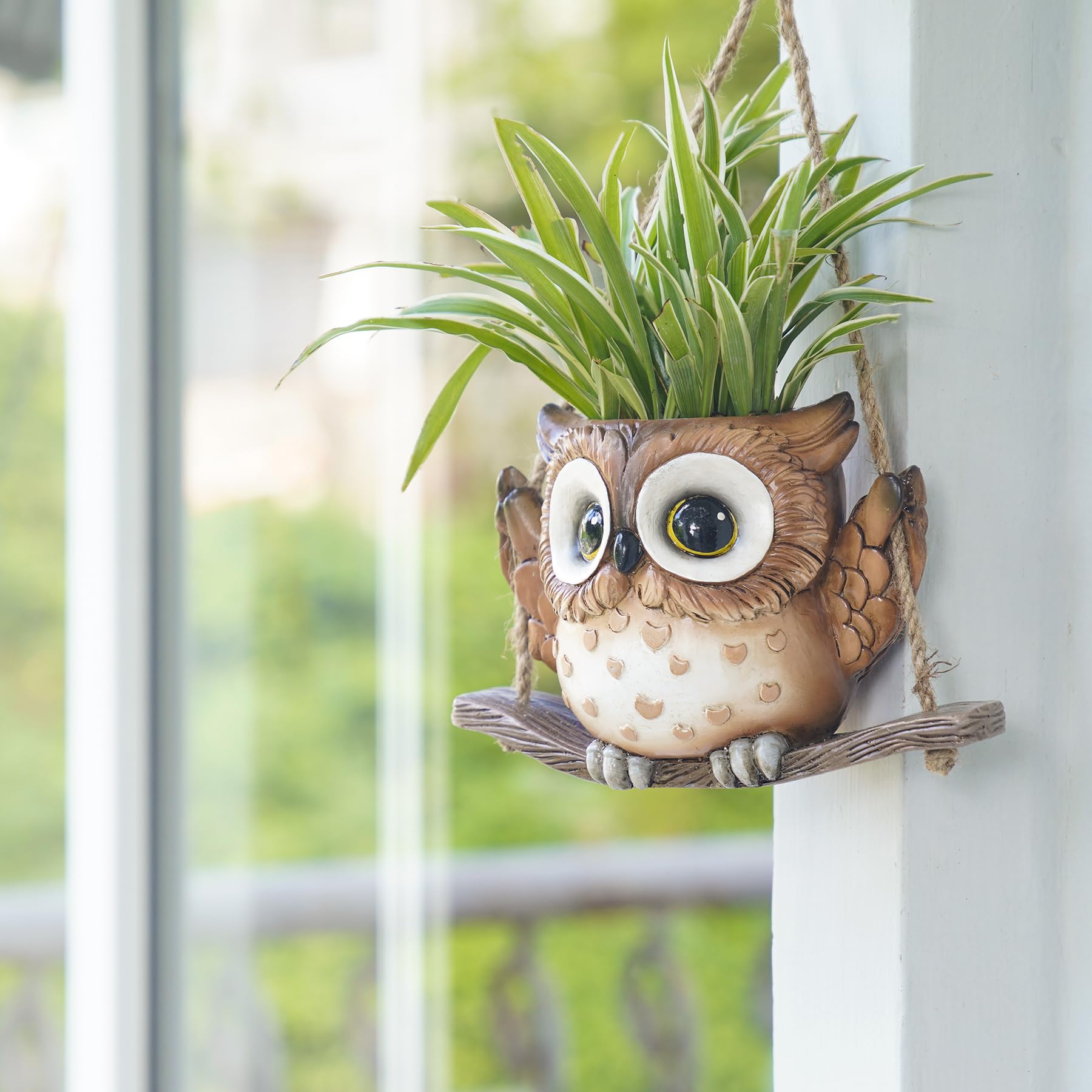 Saysmile Swing Owl planter shows drainage hole with stopper for healthy watering