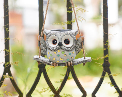 Saysmile Swing Owl planter shows drainage hole for healthy plants.