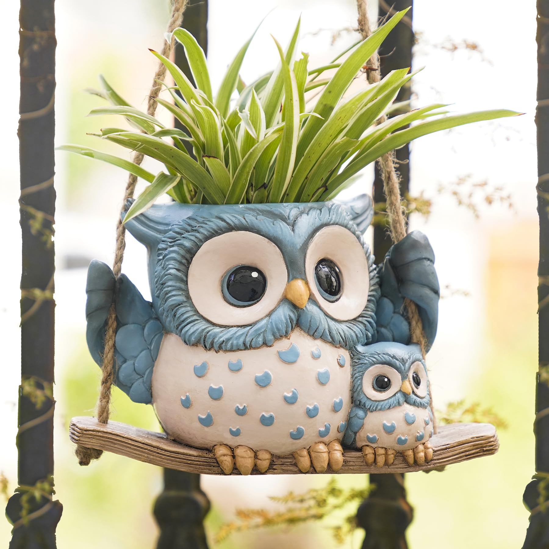 Saysmile swing owl planter on patio showing trailing plants and charm