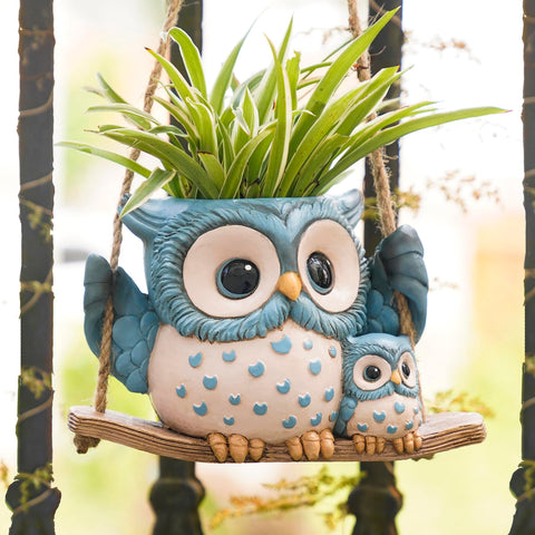 Saysmile swing owl planter on patio showing trailing plants and charm