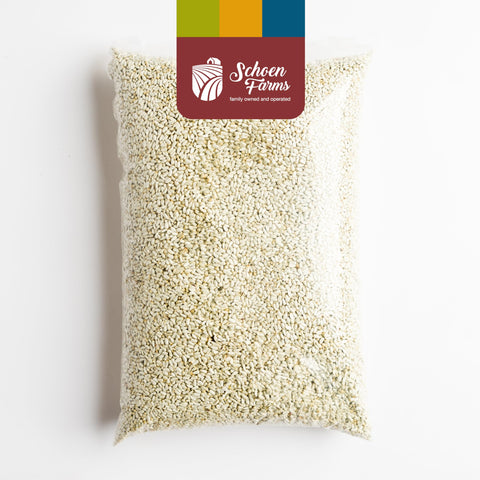 Schoen Farms Bright White Safflower Seeds entice blue jays with bold contrast and robust protein.