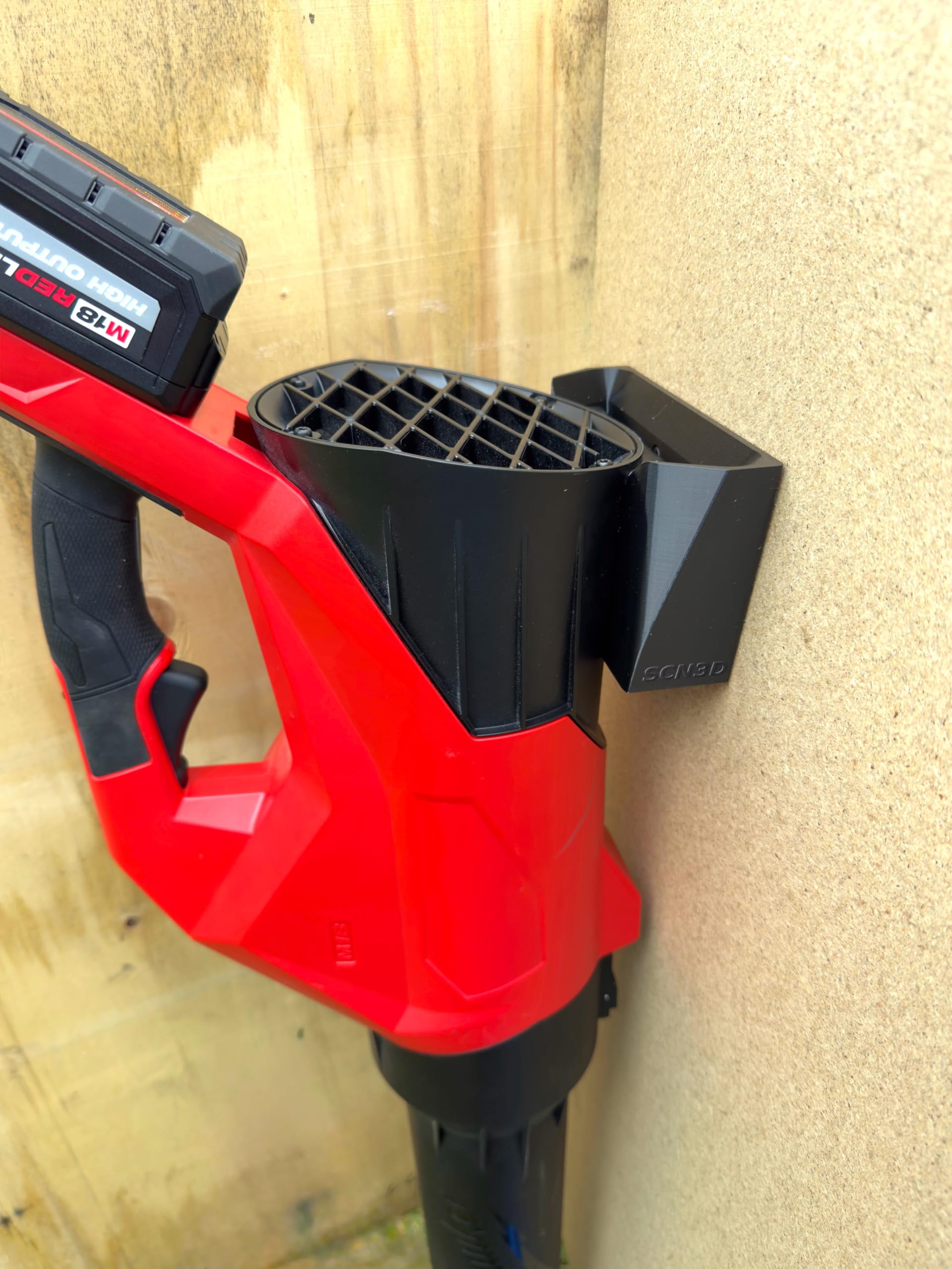 SCN3D Milwaukee M18 leaf blower secured on wall mount