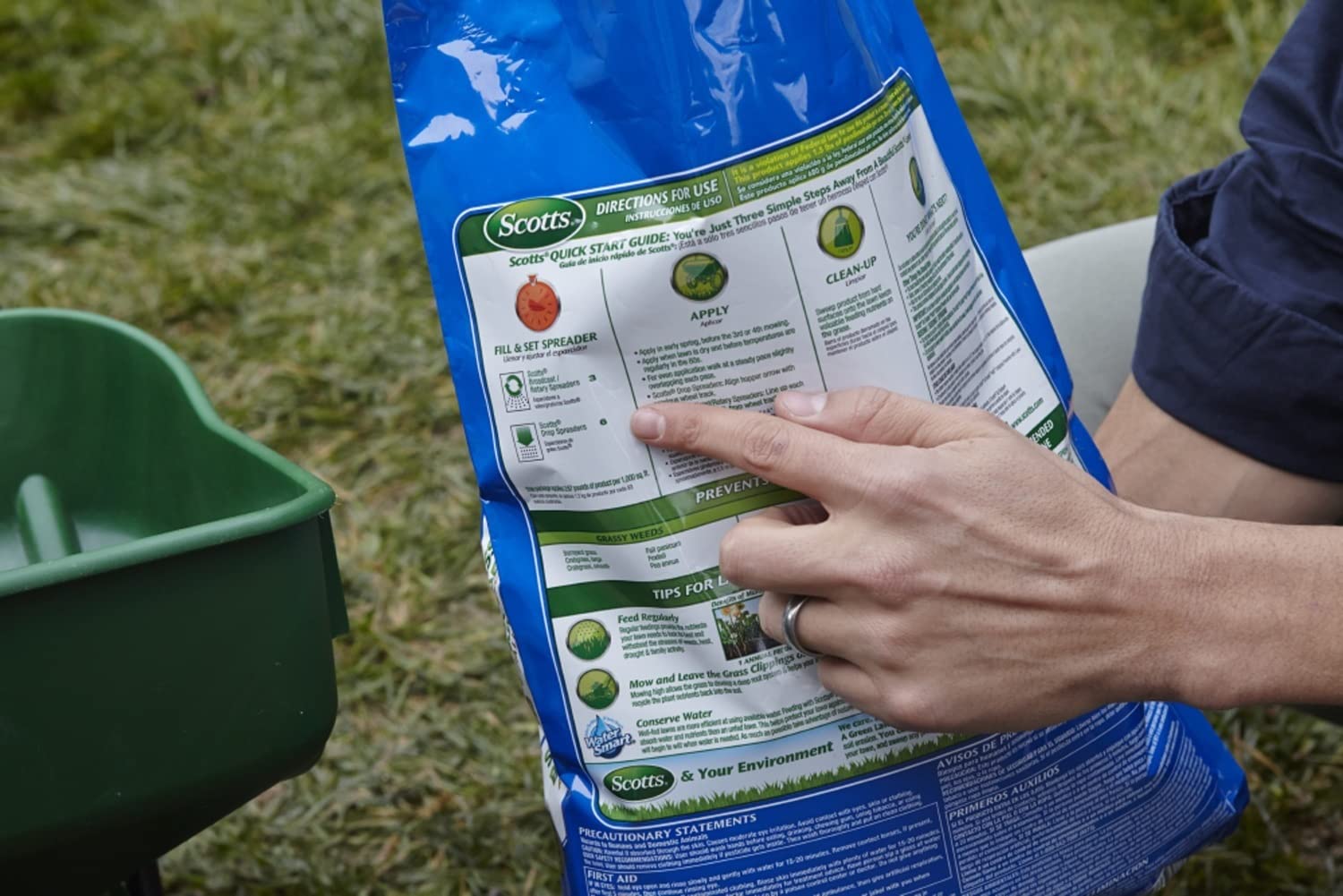 Close-up of lawn fertilizer granules designed for fast green-up after winter.