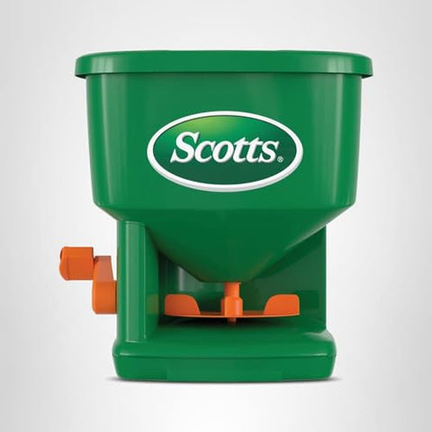 Scotts Whirl spreader in use on a lawn showing even coverage
