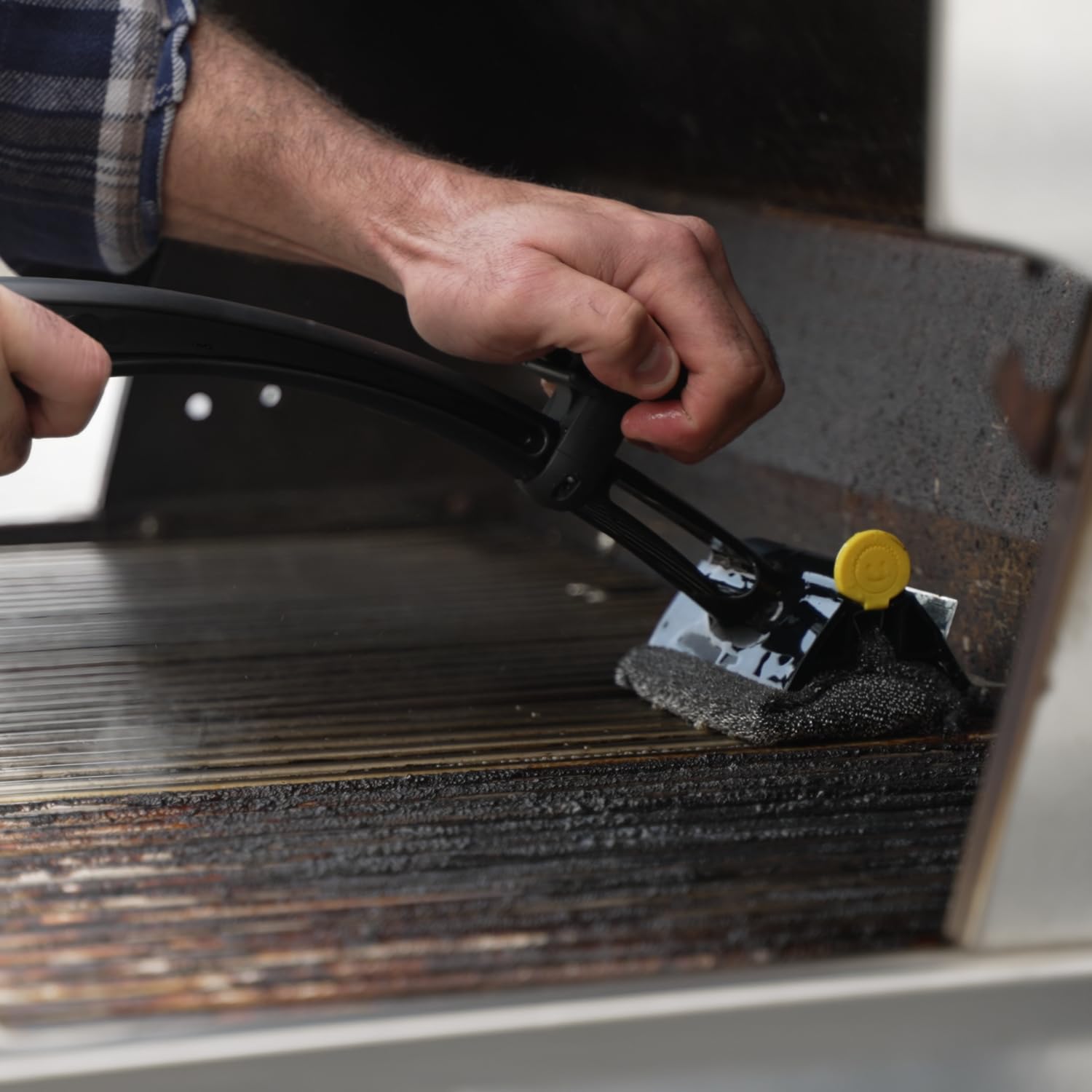 BBQ Daddy base includes a convenient bottle opener for post-cleanup breaks.