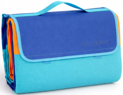 Scuddles extra large picnic blanket on grass with waterproof backing for dry comfort.