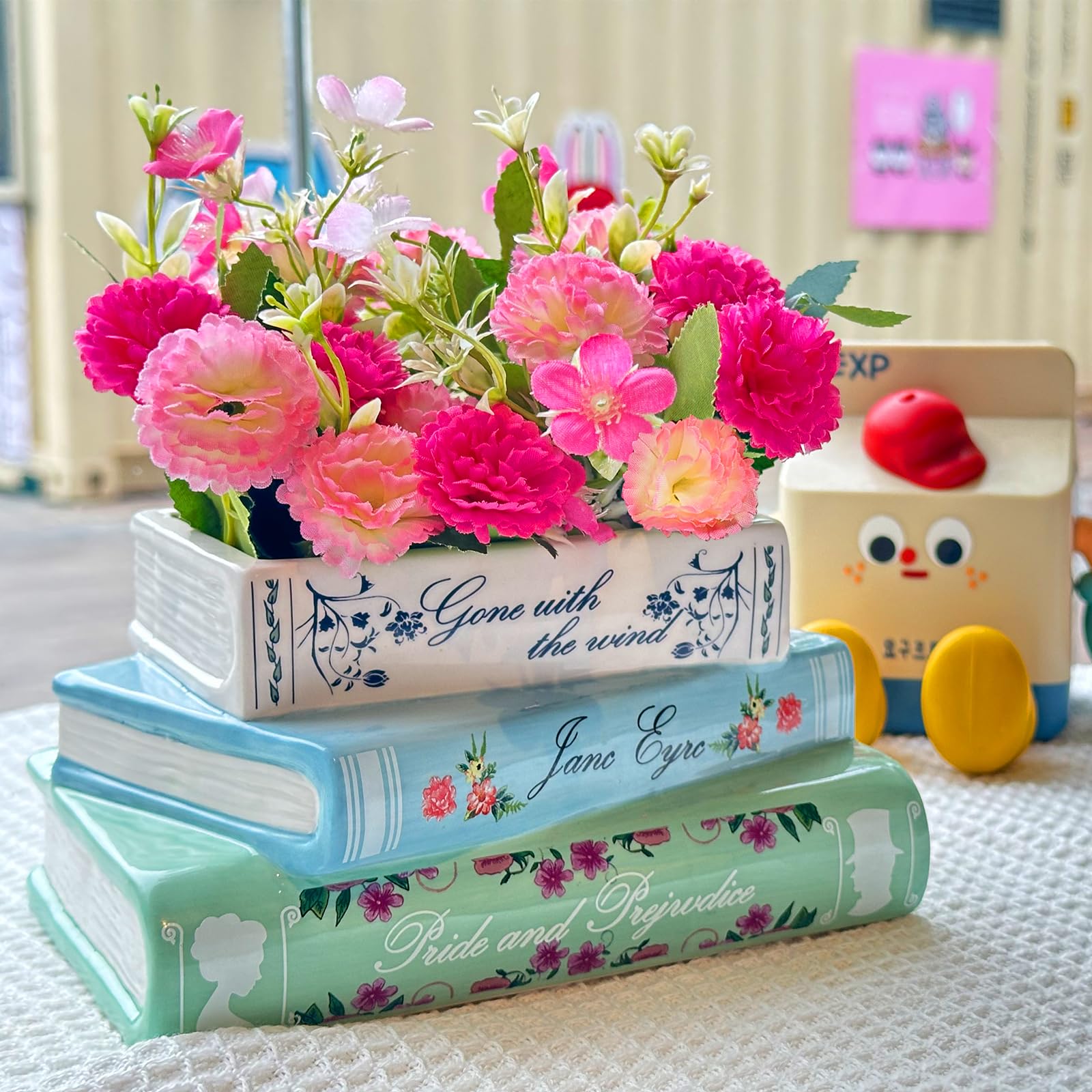 Scuyari book vase displayed with plants elevates any living space