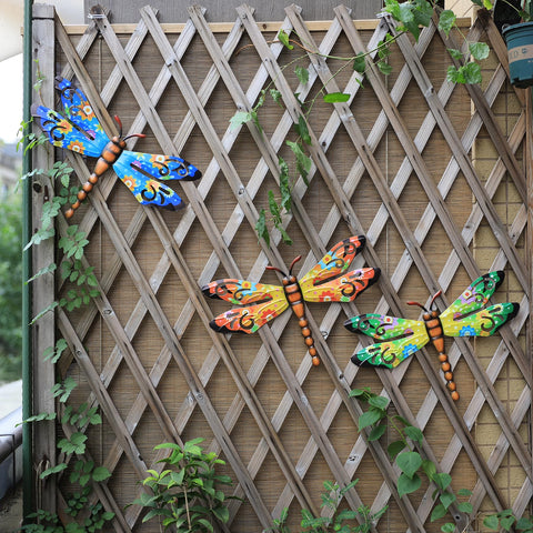 Scwhousi dragonfly wall art brightens indoor living spaces with 3-pack charm.