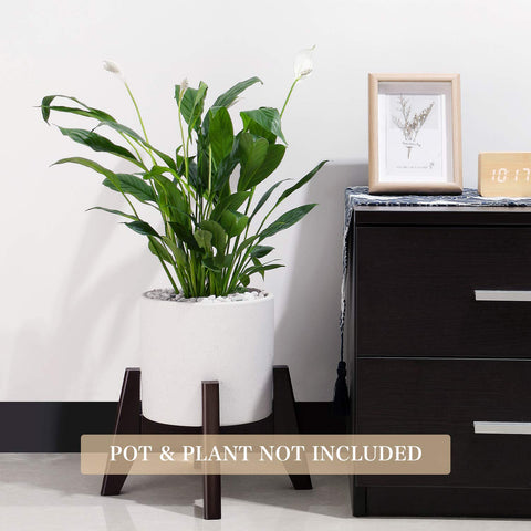 Seanmi adjustable-width stand supports 8-12 inch pots on a modern coffee table