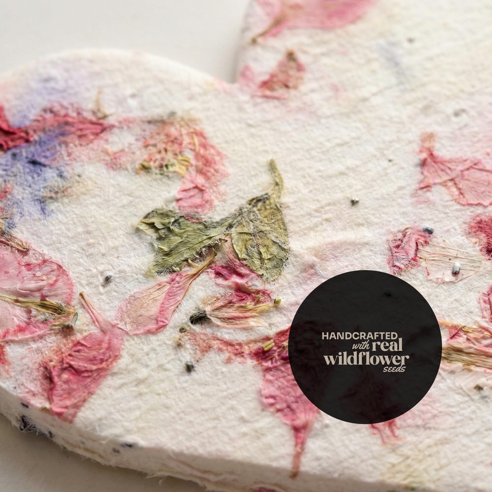 Writable surface on the pink heart seed paper