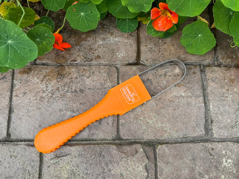 Gift-ready Seeding Square Sneaky Weeder design for eco-friendly gardeners.