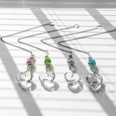 SevenFish heart suncatcher with transparent chain fills space with prisms