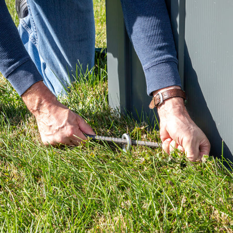 Anchored shelter setup demonstrating secure leg connections and stability