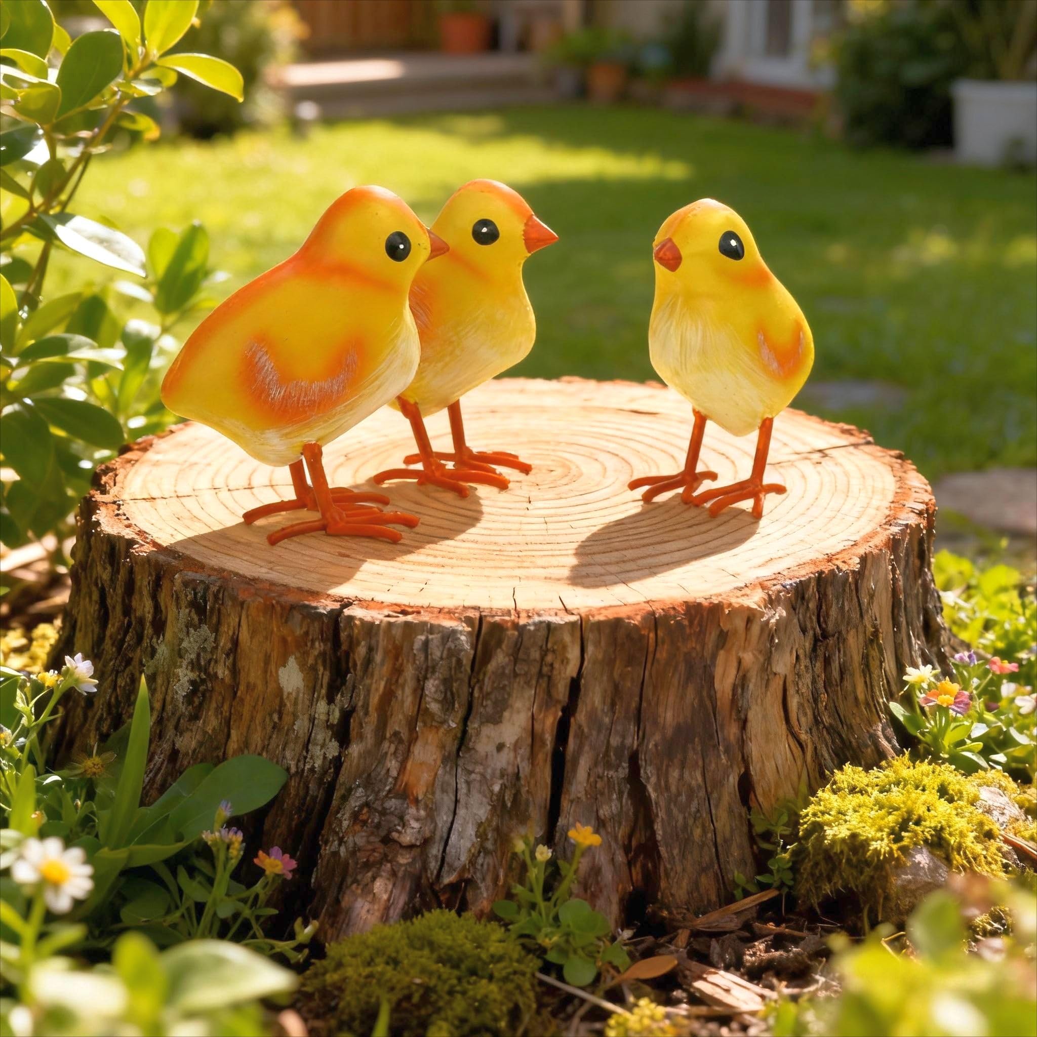 Shorayn garden chick figurines add charm to outdoor spaces.