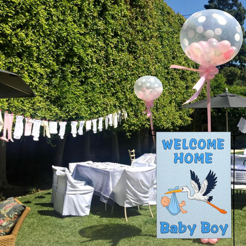 Shuitouk baby-stork decor flag adding cheerful touch to yard or porch.