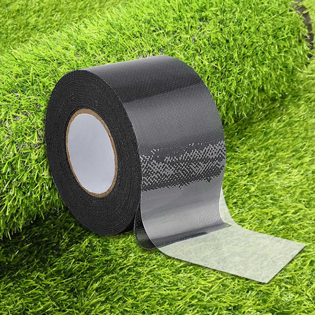 SICCOMA double-sided turf tape sealing a seam for a clean lawn appearance.