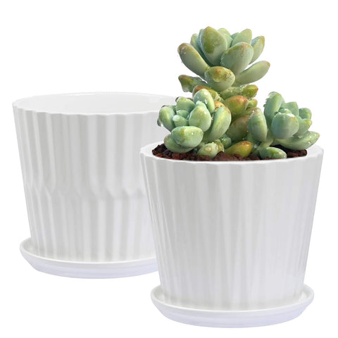 Sietpoek cylinder ceramic pot with attached saucer demonstrating integrated drainage