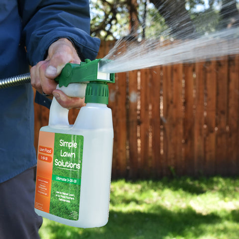 Applying Simple Lawn Solutions fertilizer to turf for convenient maintenance.
