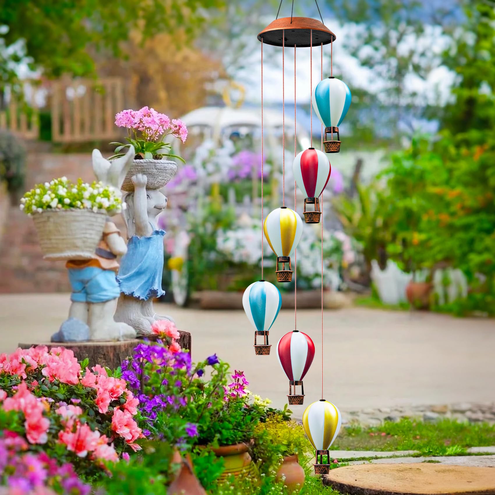 Singingarden solar powered wind chime lights up automatically for magical nighttime ambiance.