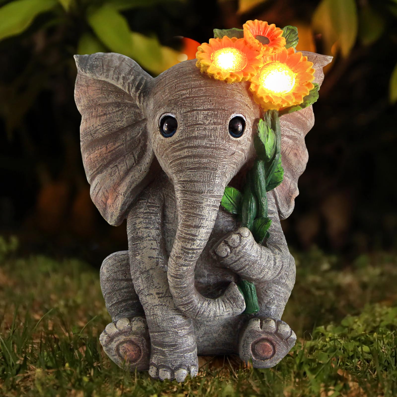 Sinhra baby elephant garden decor featuring sunflower detail.