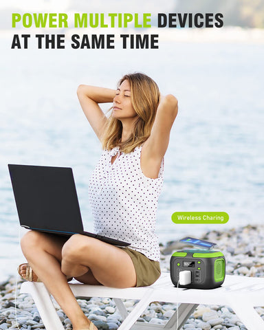 SinKeu 110V AC outlet powering a laptop while camping