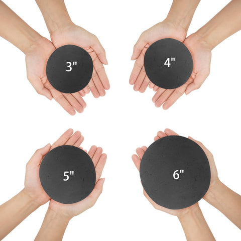 Skyflame ceramic fire spheres close-up in black finish for modern fire pits.