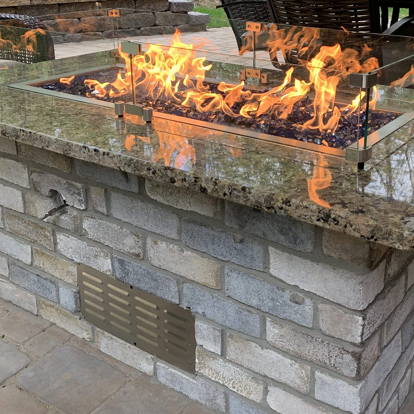 Skyflame venting panel integrated into a stone island for a clean look.