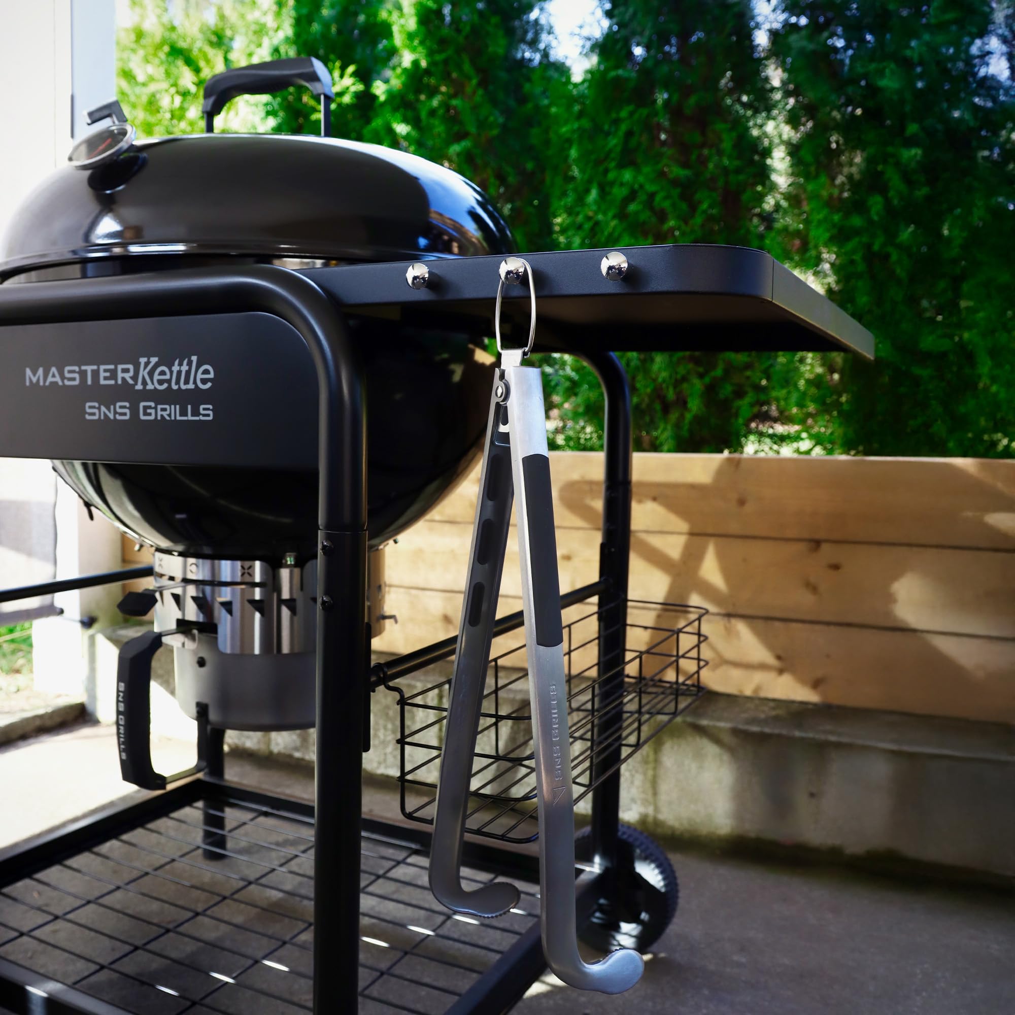 Slow 'N Sear Charcoal Cherry Picker made of 430 stainless steel for durability